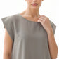 Sage Green Nida under abaya dress, neckline and cap shoulder close-up