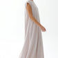 Nude Nida under abaya dress, side view