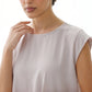 Nude Nida under abaya dress, neckline and cap shoulder close-up