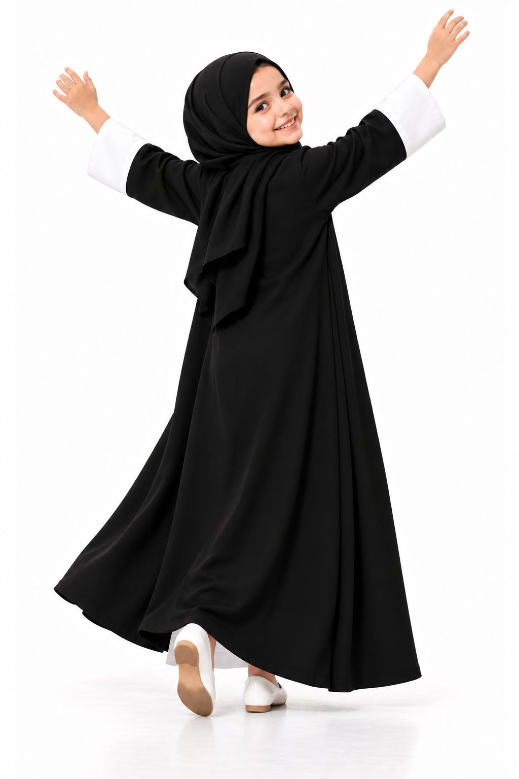 Back view of the girls' black Nida National Day abaya with arms raised