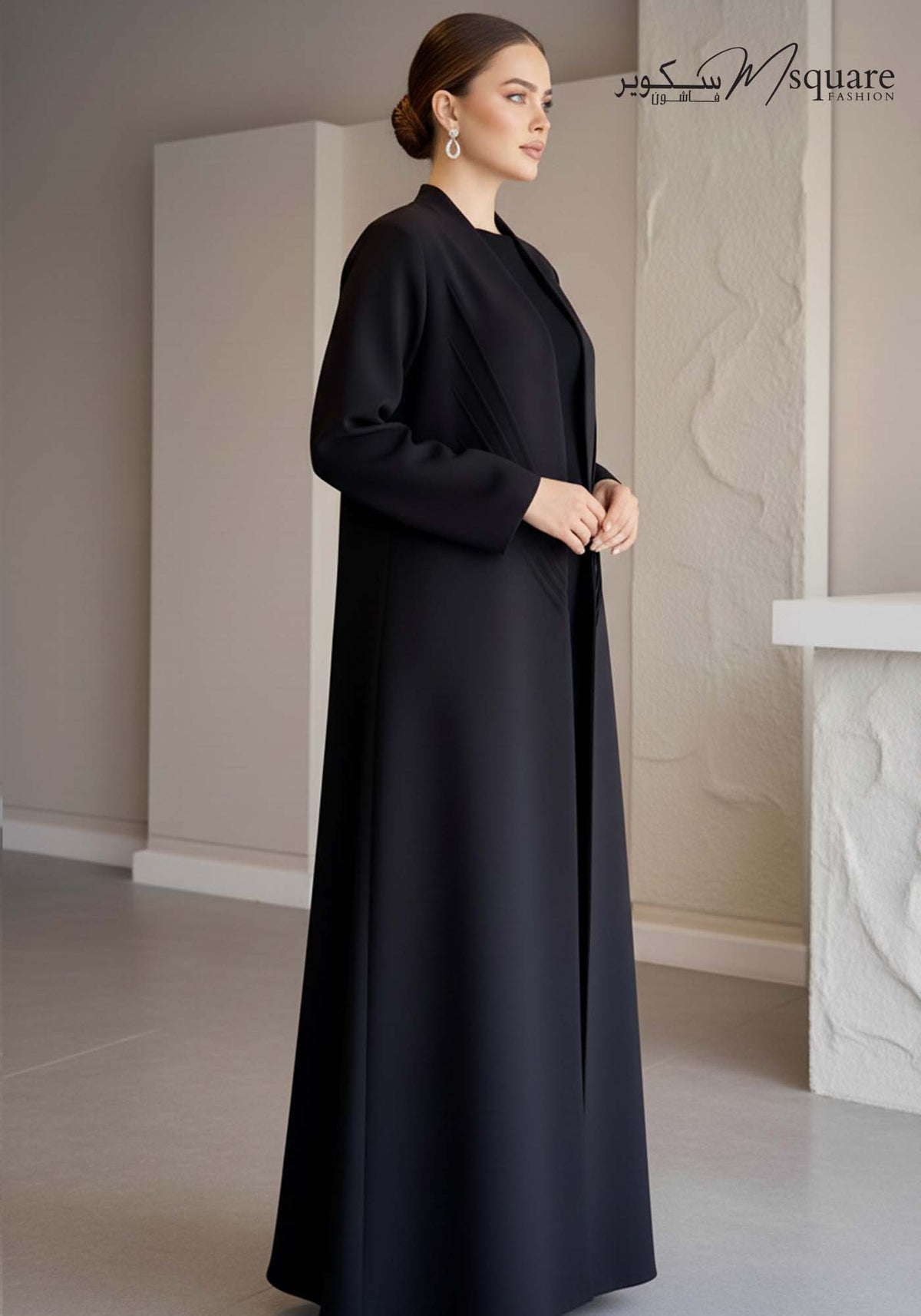 Sunburst black pleated abaya in Barbie Cobra with matching sheila, second view