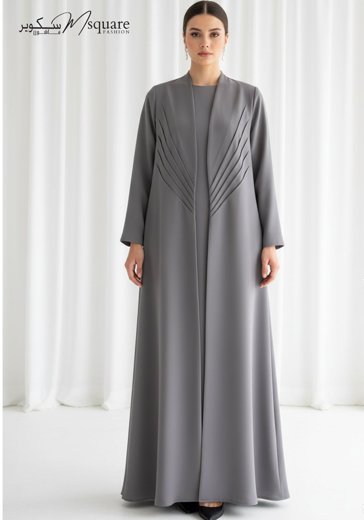 The Sunburst grey pleated abaya with matching sheila, made in the UAE