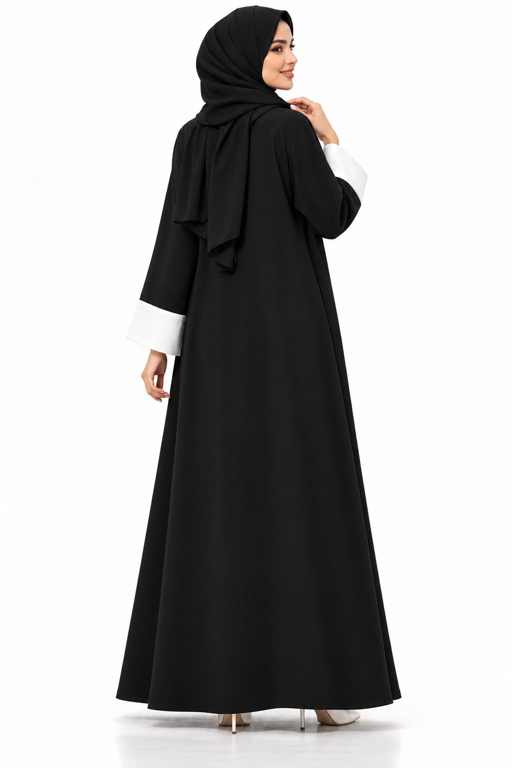 Back view of the black Nida National Day abaya with plain back and white cuffs
