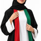 Close-up of the red and green bands and white cuffs on the women's abaya